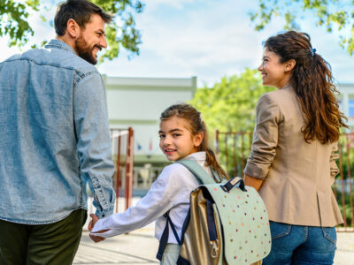 parents going to school with their daughter